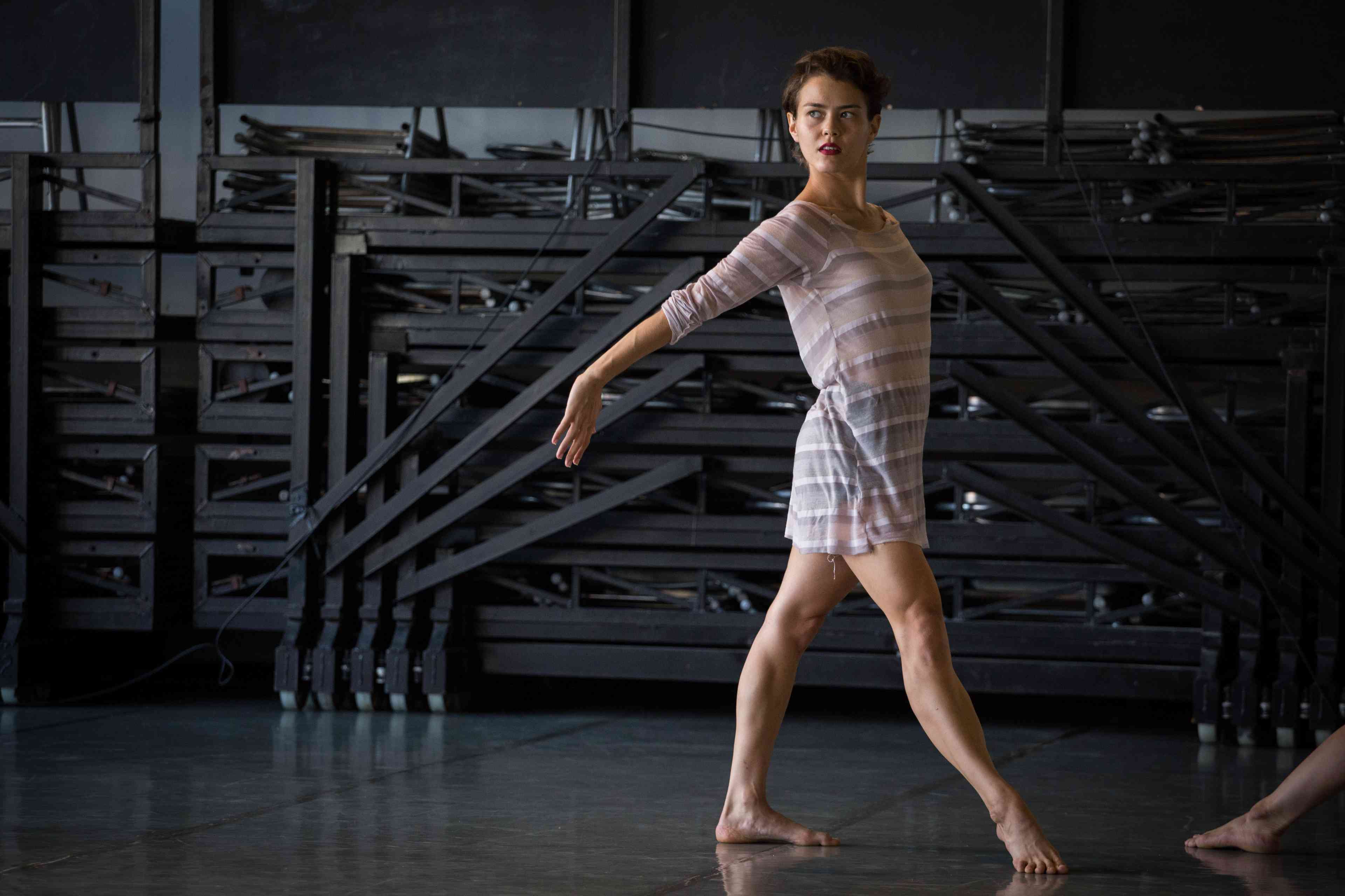 Dancers of the Batsheva Dance Ensemble seen during rehearsals background