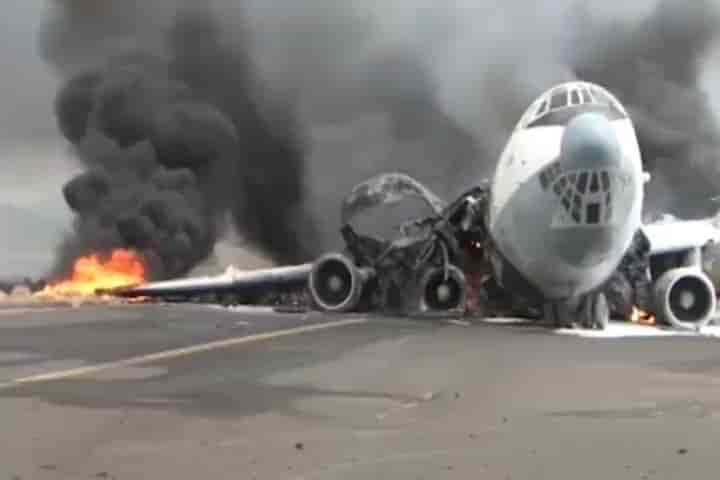 A Houthi aircraft in flames following the Israeli Air Force strike on Sanaa Airport background