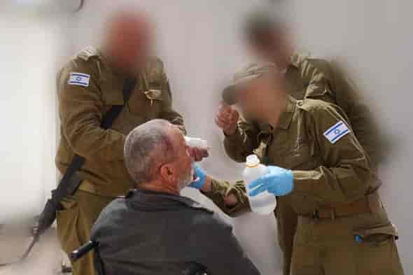 IDF treating civilians in Syria background