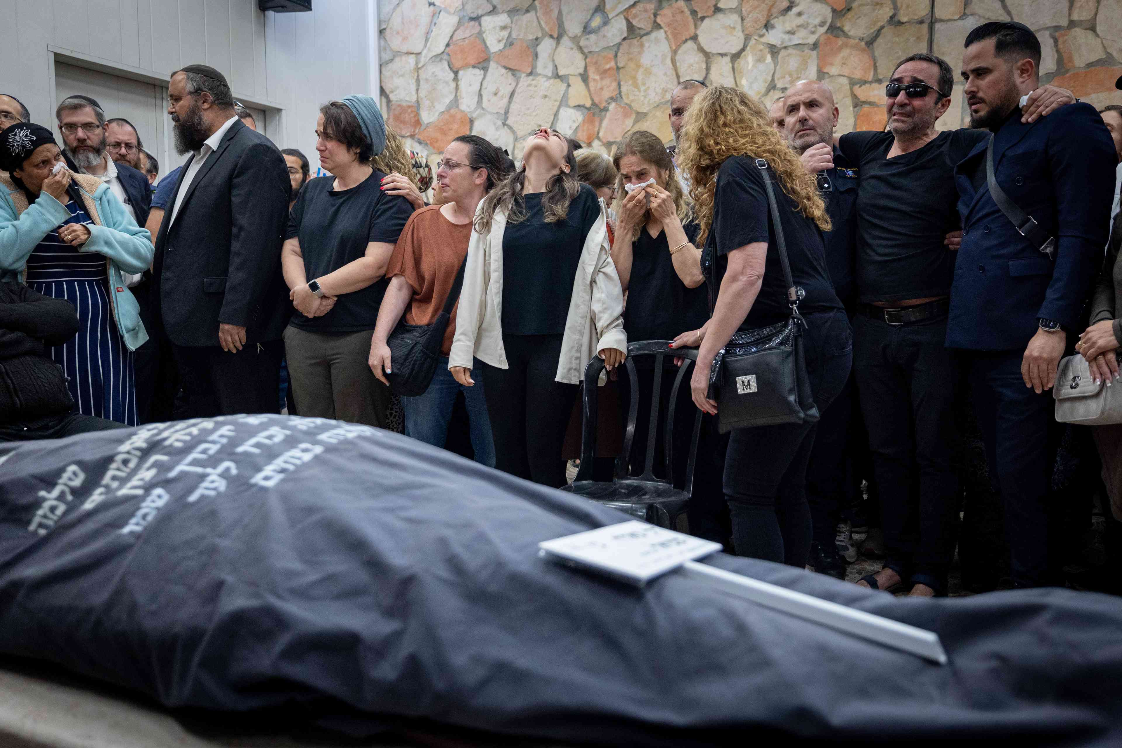 Family and friends attend the funeral of Tzeela Gez who were murdered in a terror shooting attack on Route 446 yesterday, at Har HaMenuchot Cemetery in Jerusalem, May 15, 2025. background