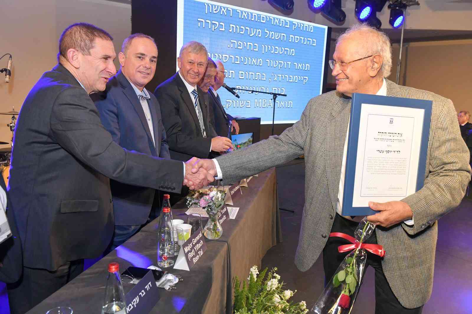 Receiving a Lifetime Achievement Award for Energy from the State background