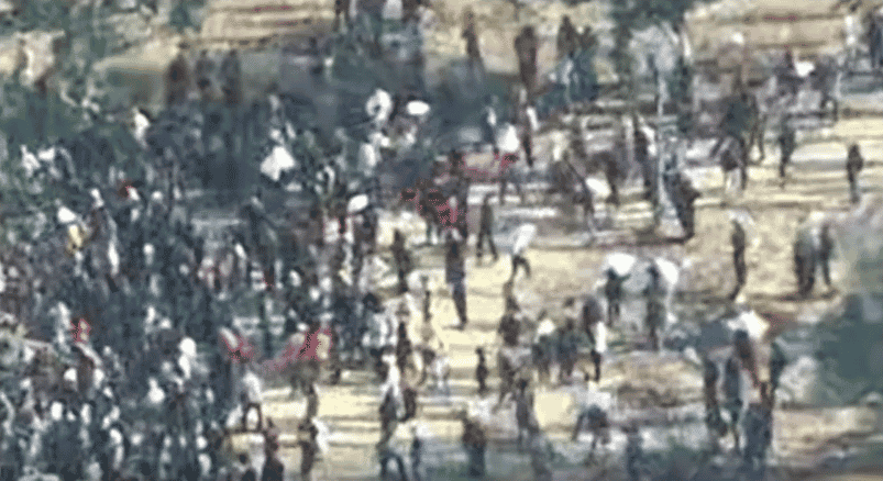 Hamas firing on civilians seeking food. background