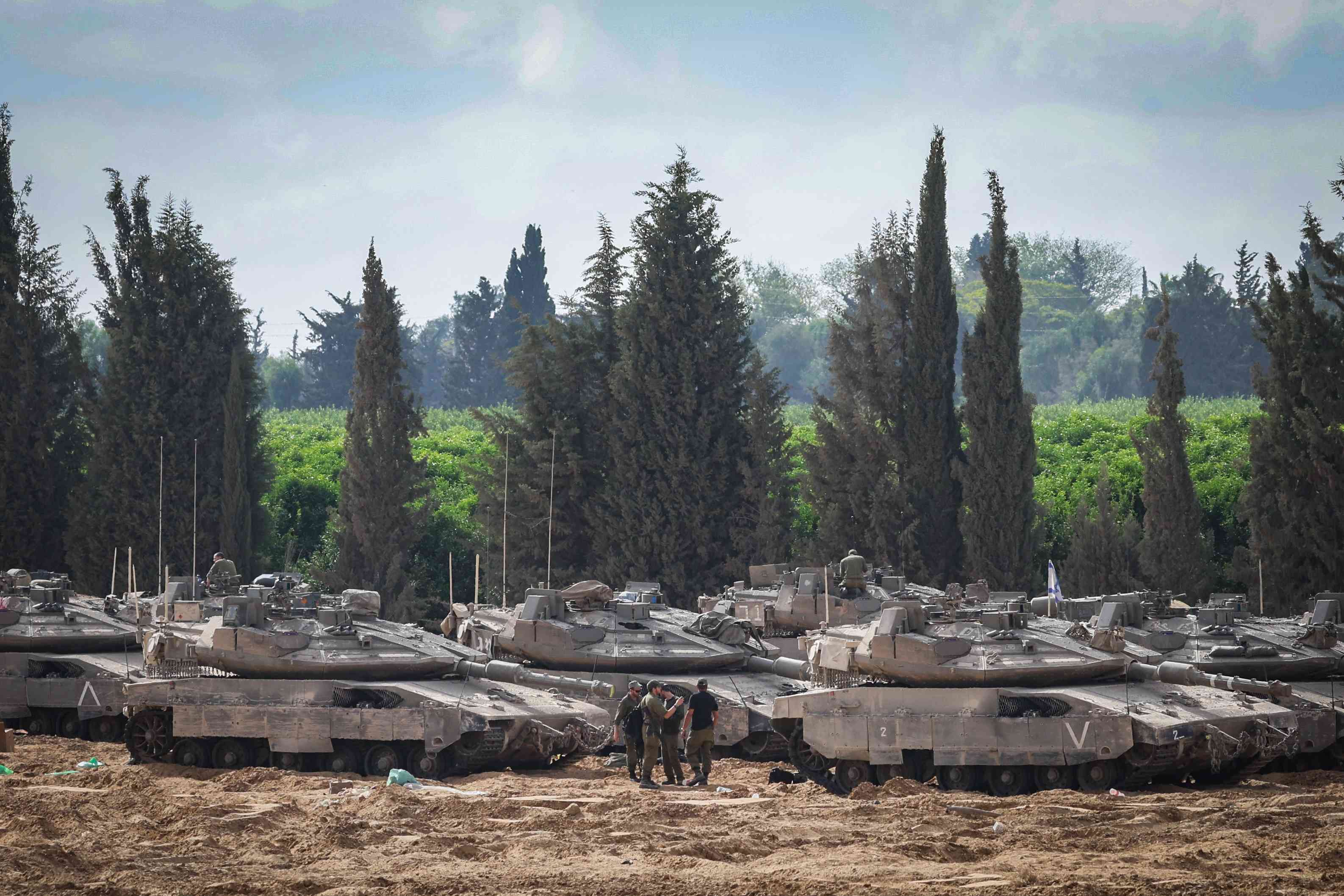 Israeli soldiers at a staging area near the Israeli-Gaza border, southern Israel, May 19, 2025.  background