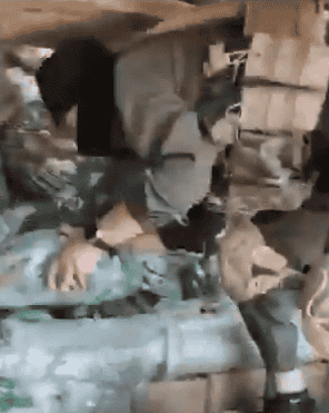 Julani's forces seizing weapons. background