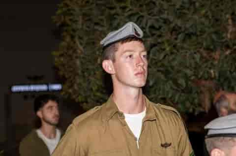 19-year-old Sergeant First Class Yoav Rower. background