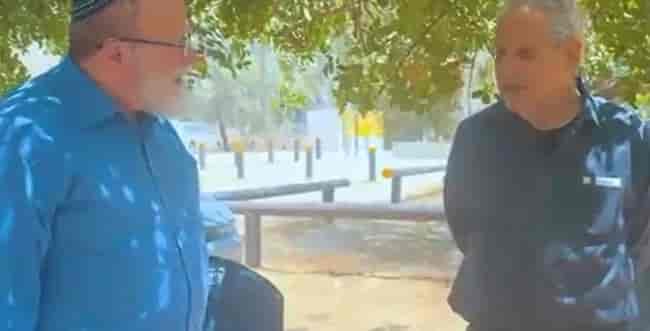 Rabbi Eli Sadan and Major General Giora Eiland. background