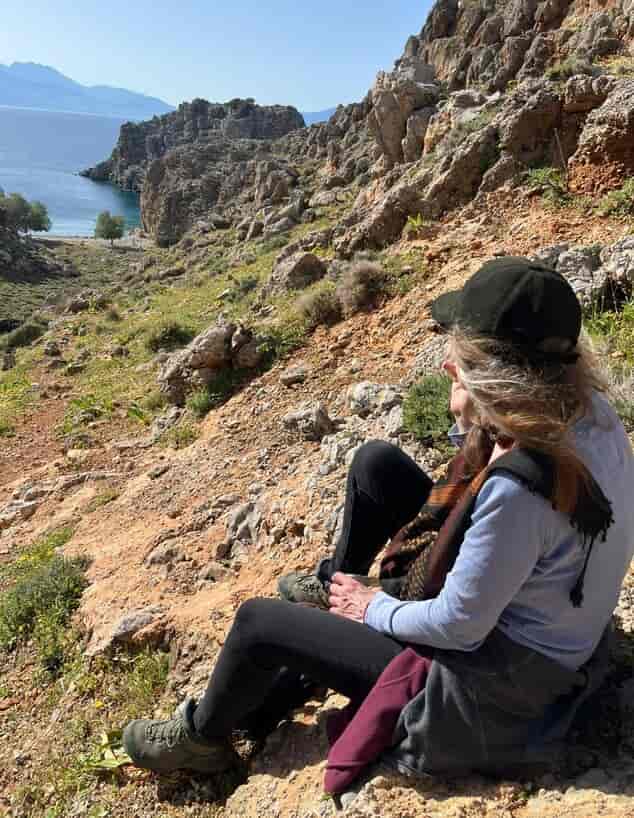 Michal Peleg on a hike in Greece background