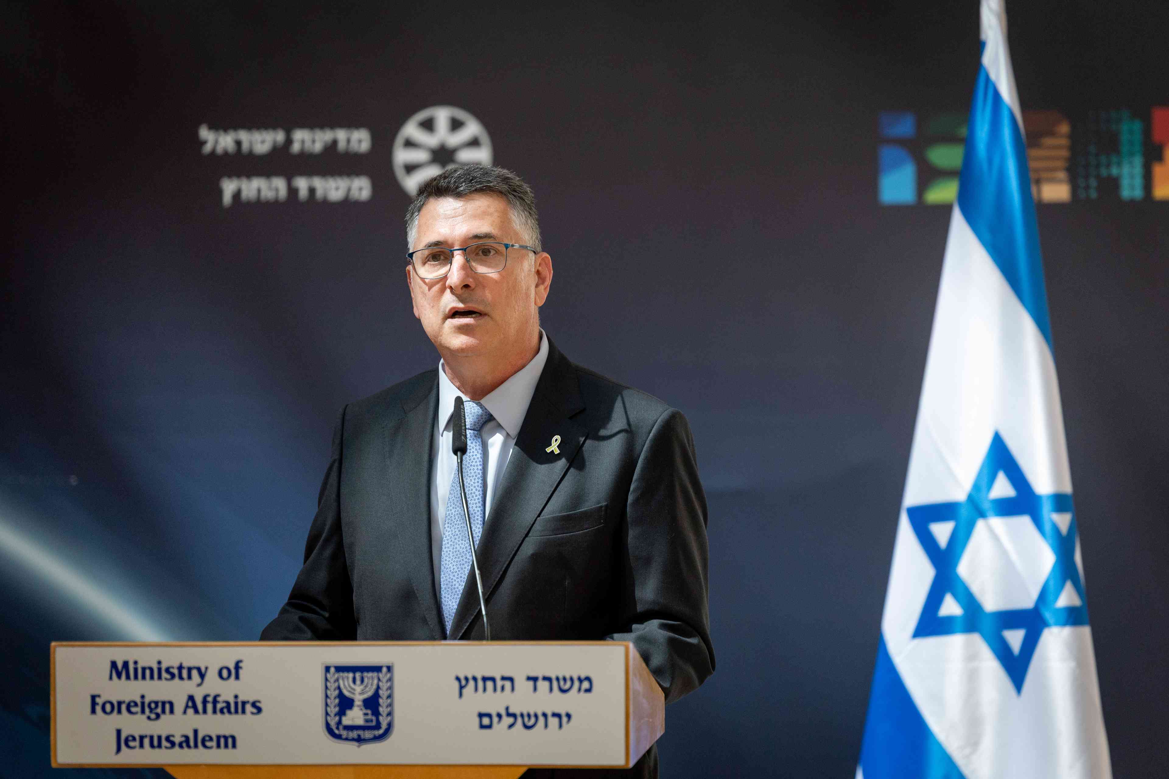 Foreign Minister Gideon Sa'ar. background