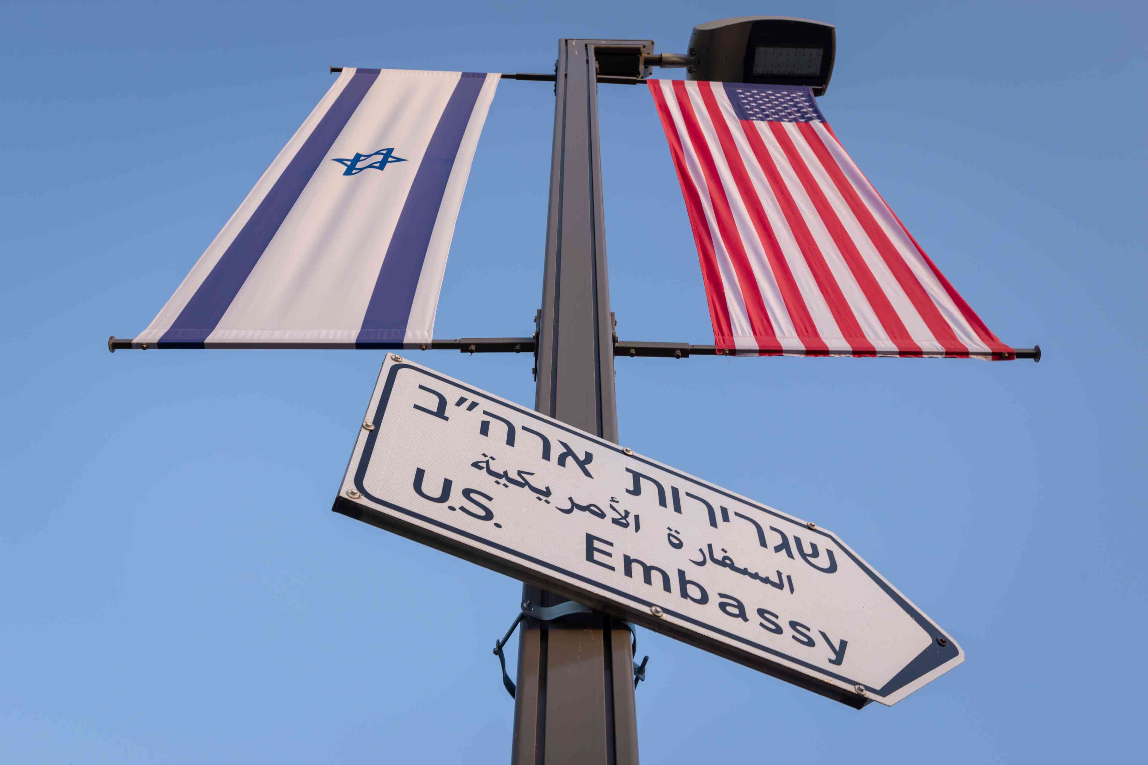 Entrance Sign leading to the United States Embassy background