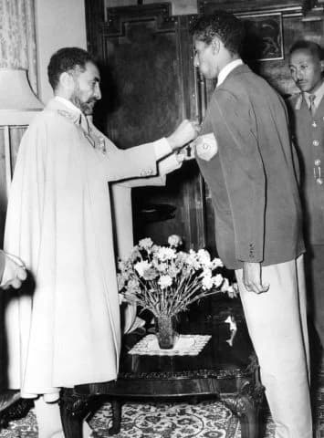 Abebe Bikila receives the title of "Star of Ethiopia" from the emperor Abebe Bikila receives the title of "Star of Ethiopia" from the emperor