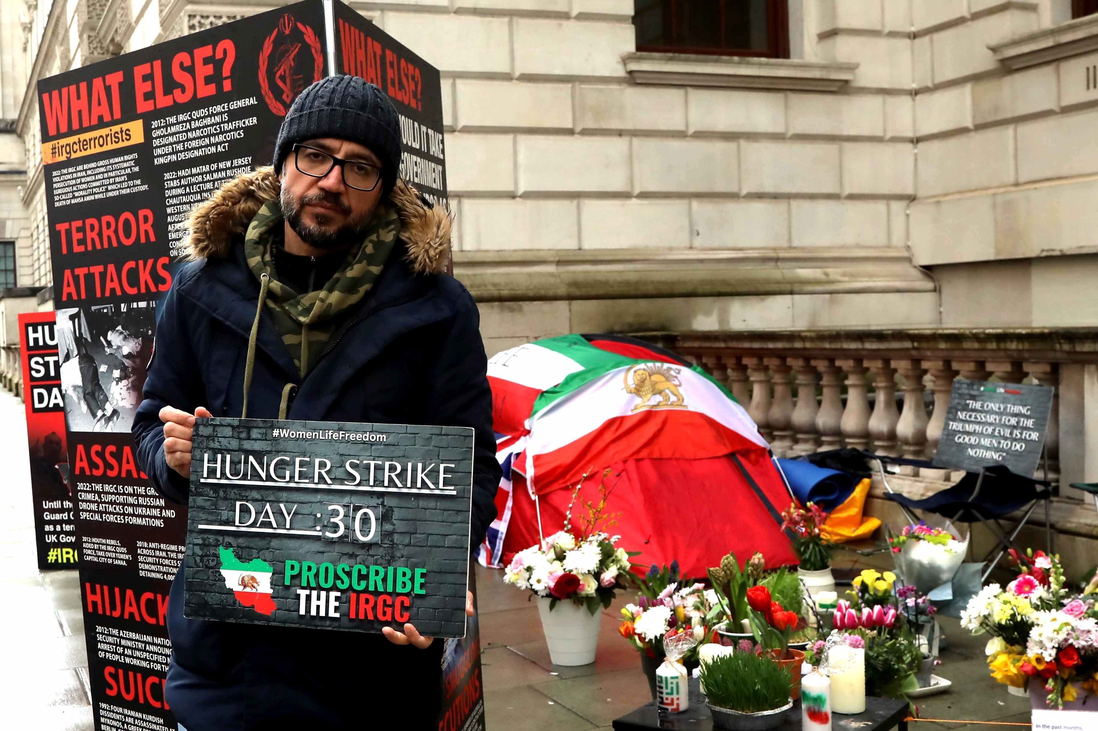 London, UK – March 24 2023: British-Iranian human rights activist Vahid Beheshti on hunger strike outside the Foreign Office in London. London, UK – March 24 2023: British-Iranian human rights activist Vahid Beheshti on hunger strike outside the Foreign Office in London.