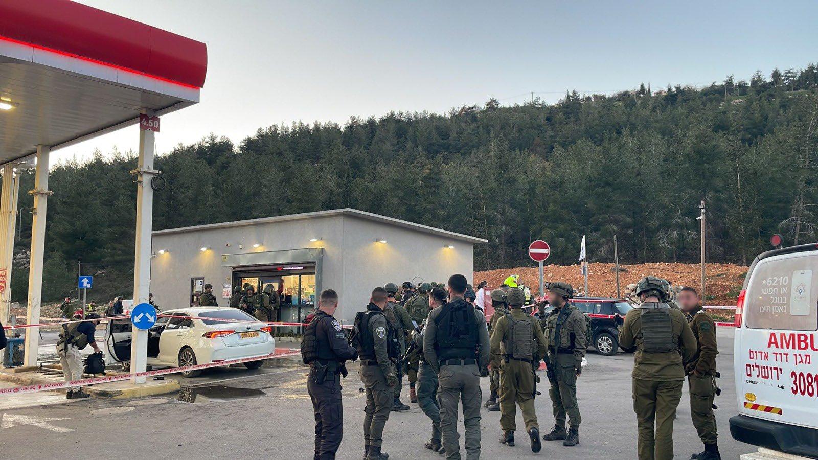 Security forces at the scene of the attack.
