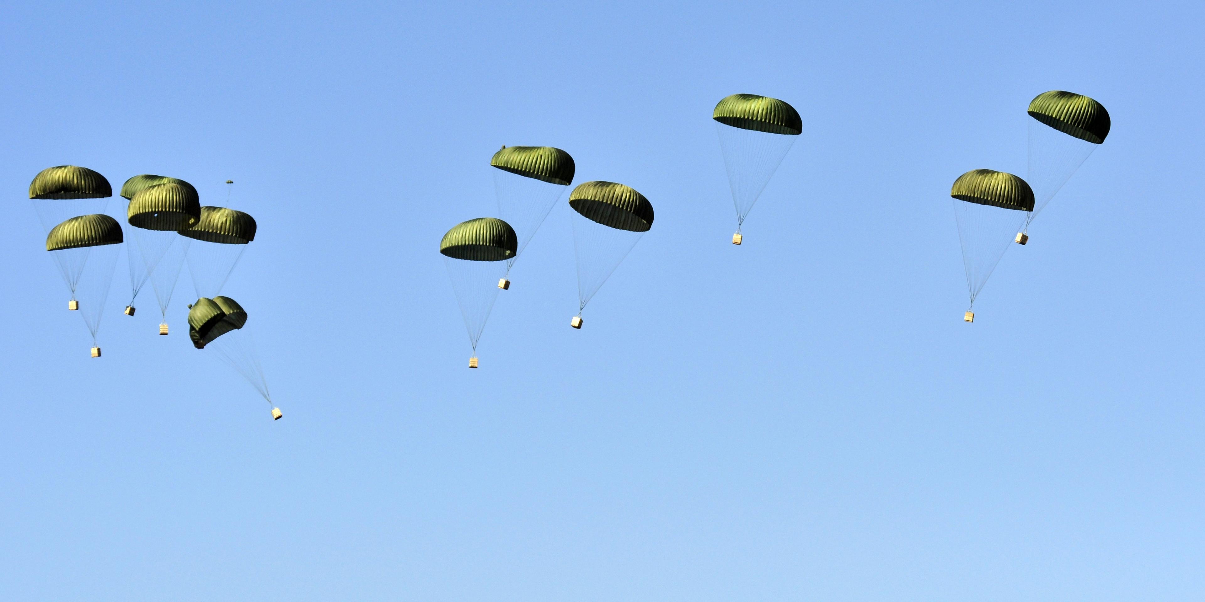 Airdropping supplies. Illustration.