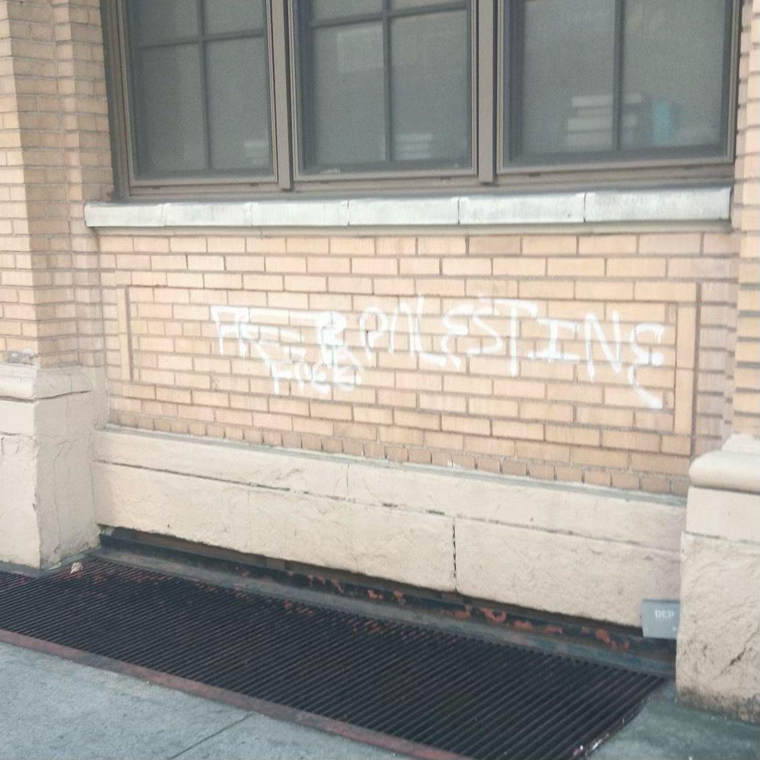"Free Palestine" on the yeshivah walls.