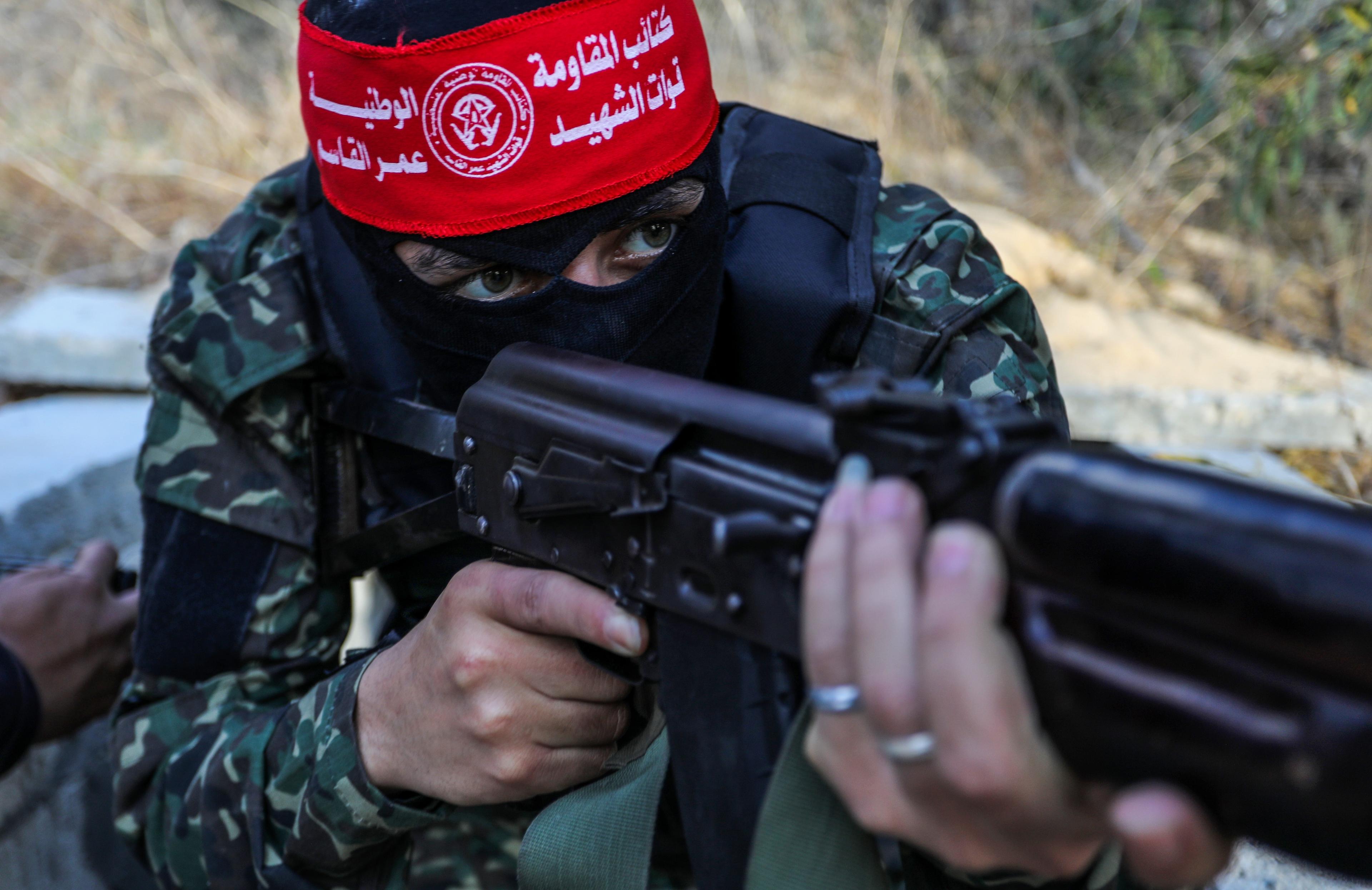 Fighters from the Democratic Front for the Liberation of Palestine (DFLP) take part in training drills in the southern Gaza Strip, on May 19, 2023. Fighters from the Democratic Front for the Liberation of Palestine (DFLP) take part in training drills in the southern Gaza Strip, on May 19, 2023.