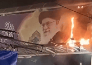 Burning the image of the Supreme Leader. Burning the image of the Supreme Leader.