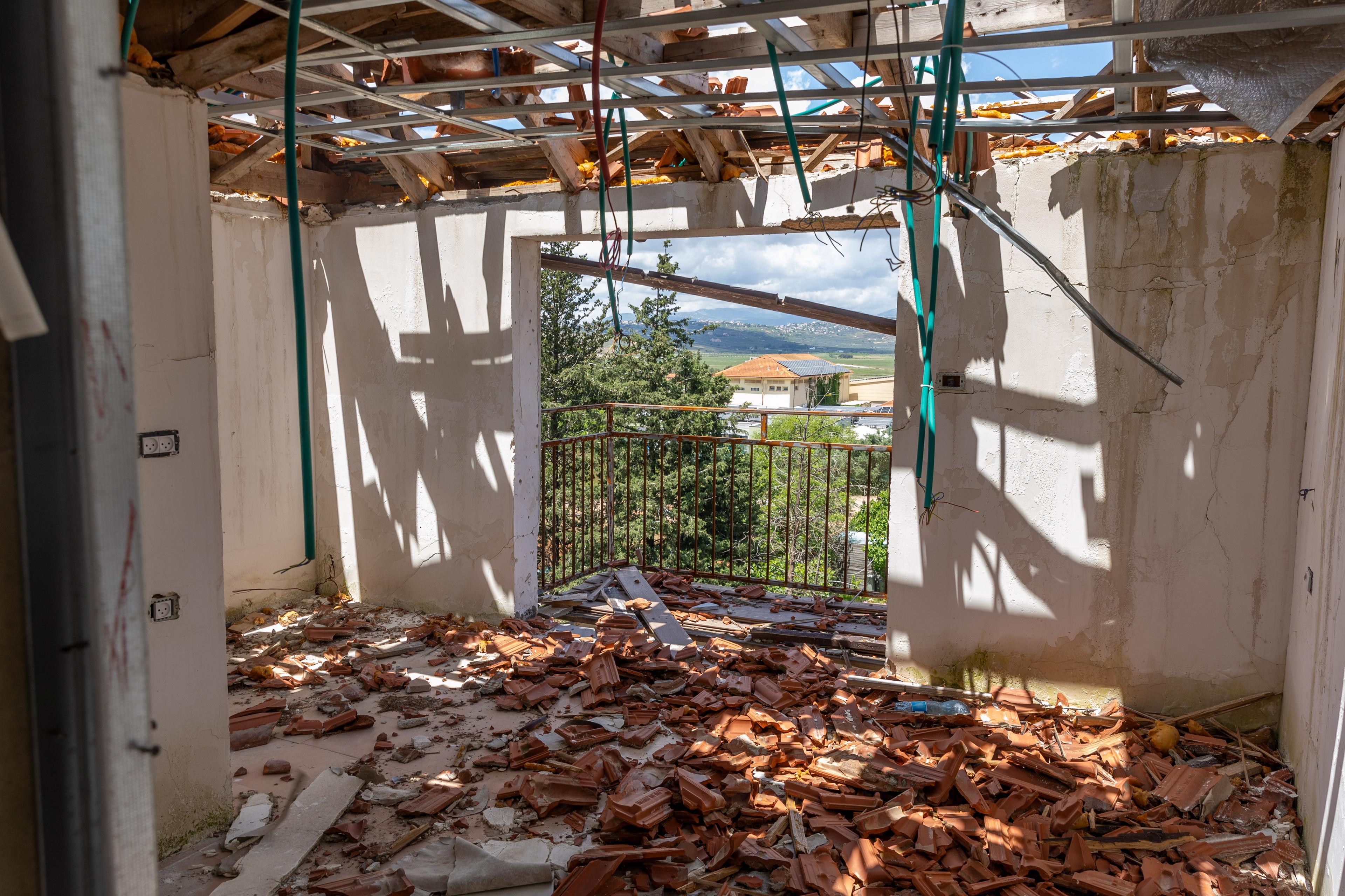 House damaged by Hezbollah projectile.