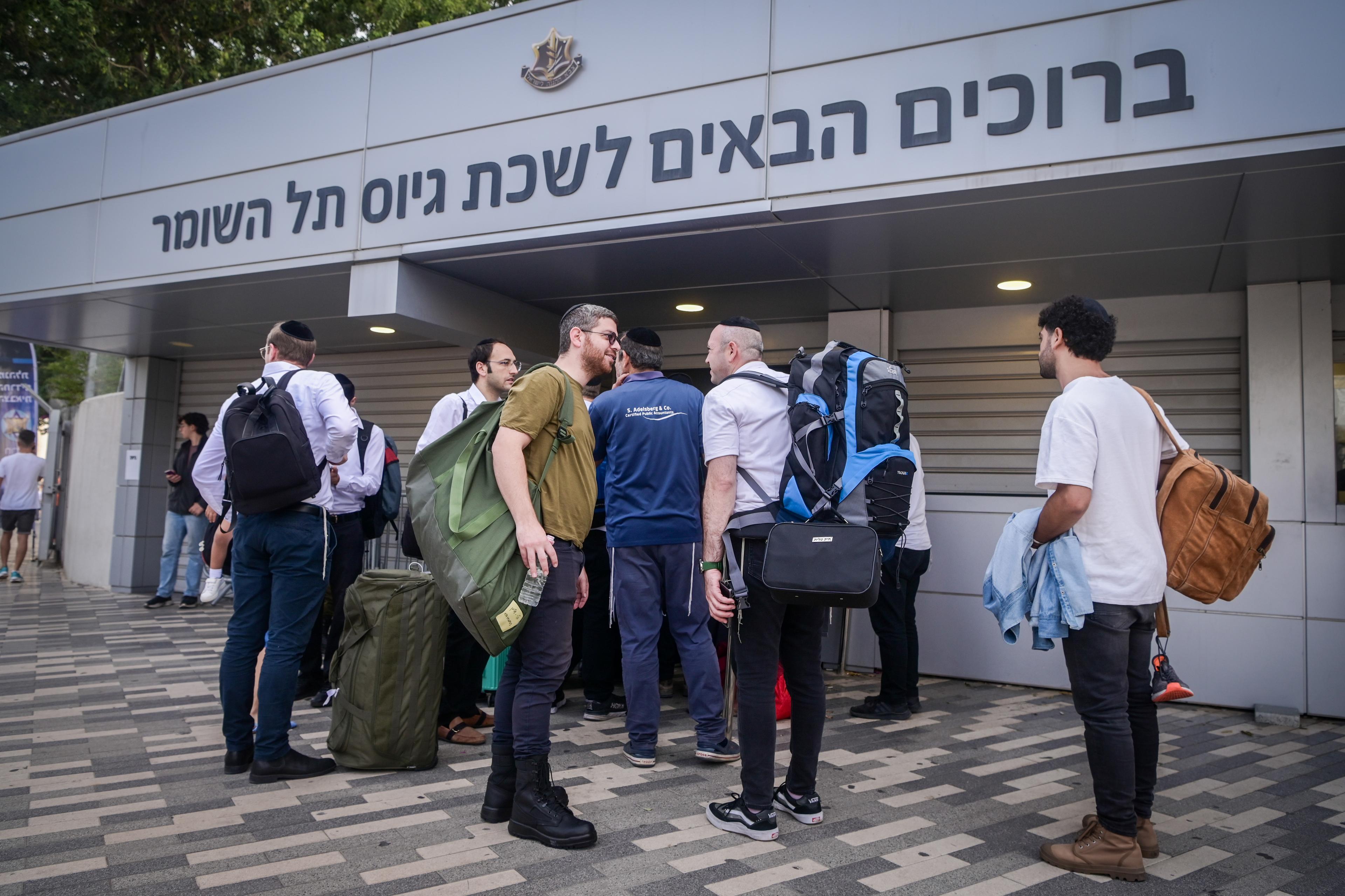 Charedi young men at the Tel Hashomer recruitment office.