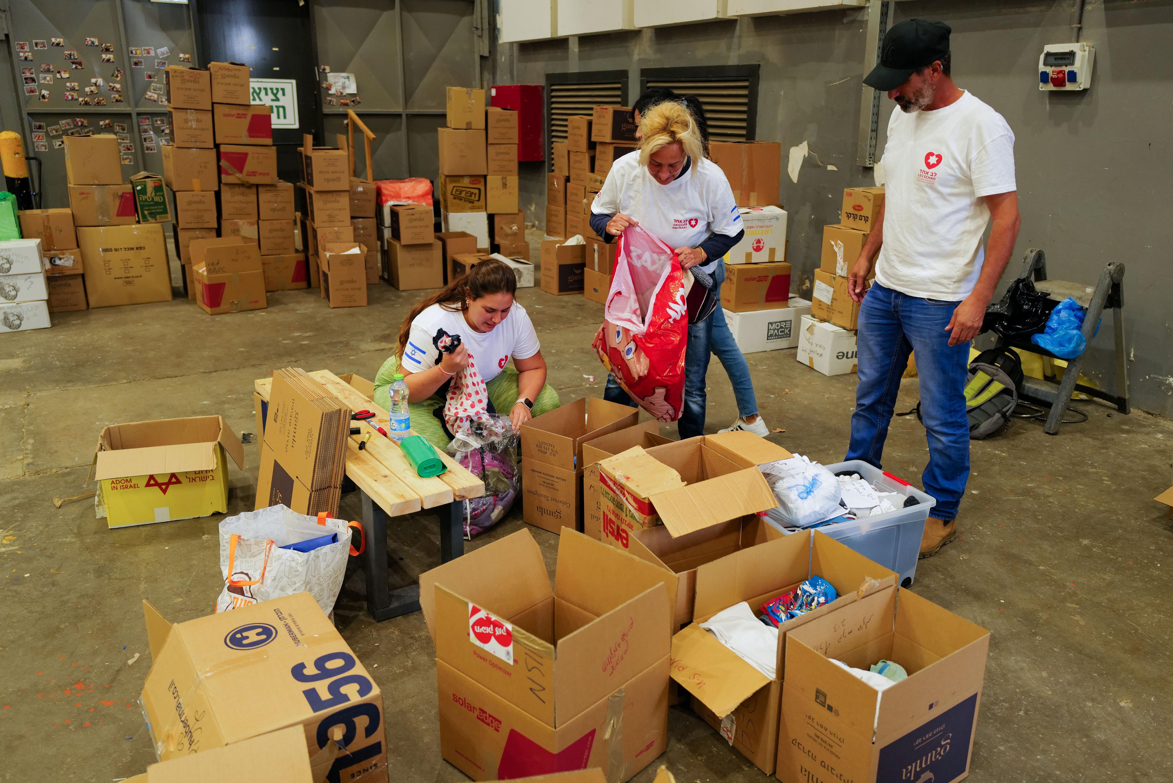 Organisation sorting through donations for evacuees Organisation sorting through donations for evacuees
