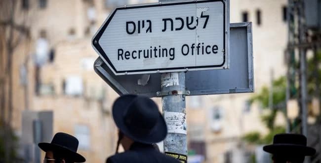 Haredim near the draft office.