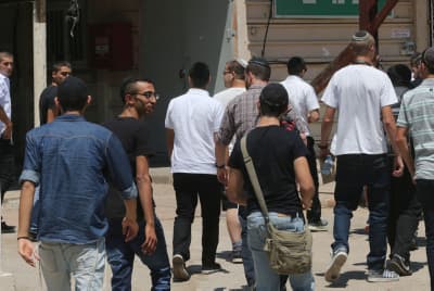 Ultra-orthodox Jewish men arrive at the Bakum Reception and Sorting base in Tel Hashomer Ultra-orthodox Jewish men arrive at the Bakum Reception and Sorting base in Tel Hashomer