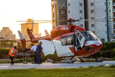 Medics evacuate from a helicopter a wounded Israeli soldier at the Beilinson hospital in Petah Tikva Medics evacuate from a helicopter a wounded Israeli soldier at the Beilinson hospital in Petah Tikva