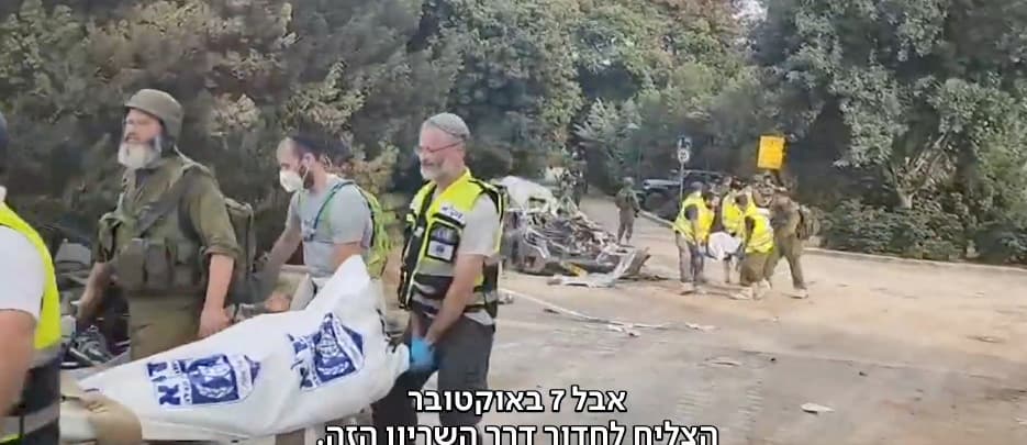 ZAKA volunteers carry bodies of those murdered by Hamas on October 7 ZAKA volunteers carry bodies of those murdered by Hamas on October 7
