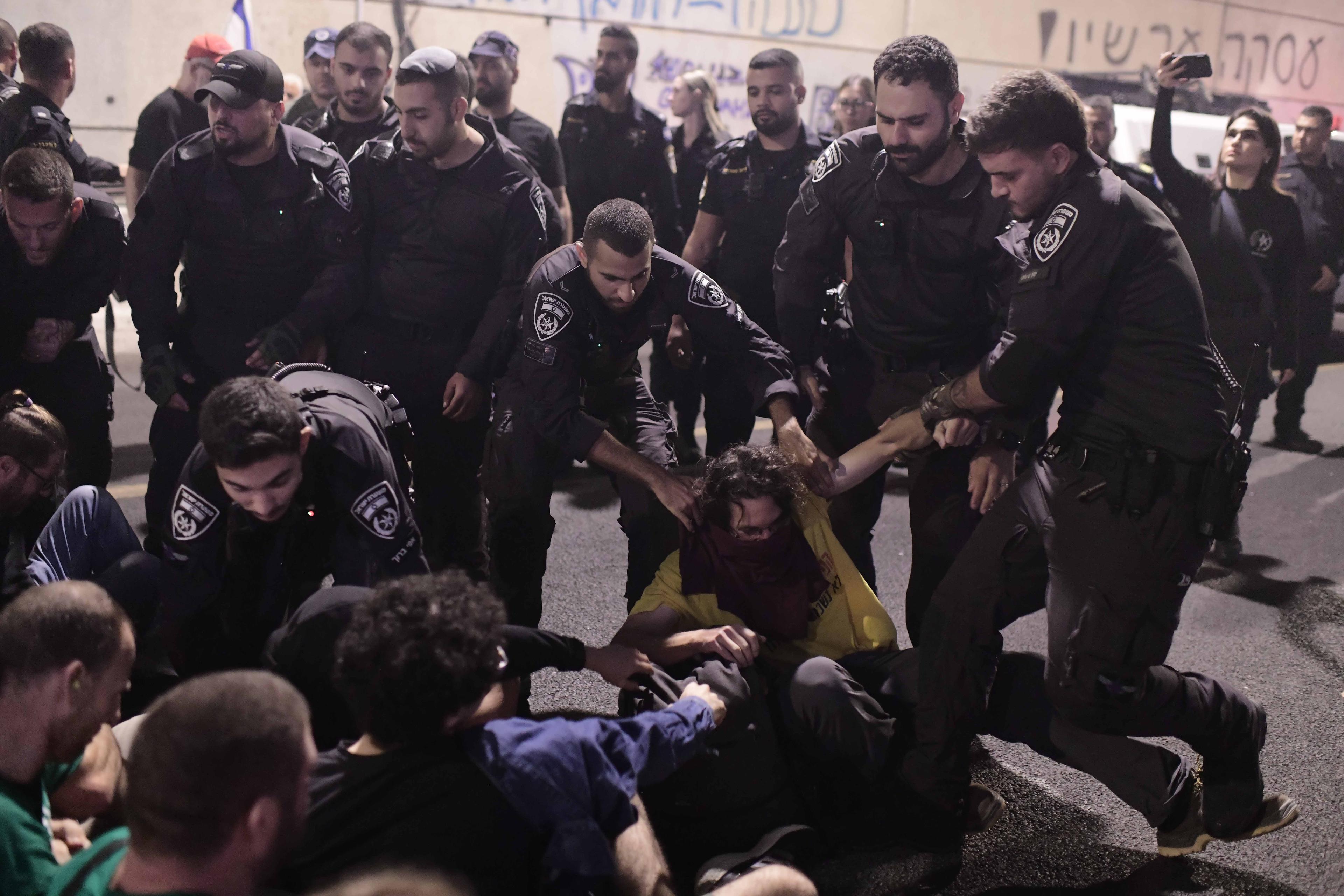 Police arrest protesters Police arrest protesters