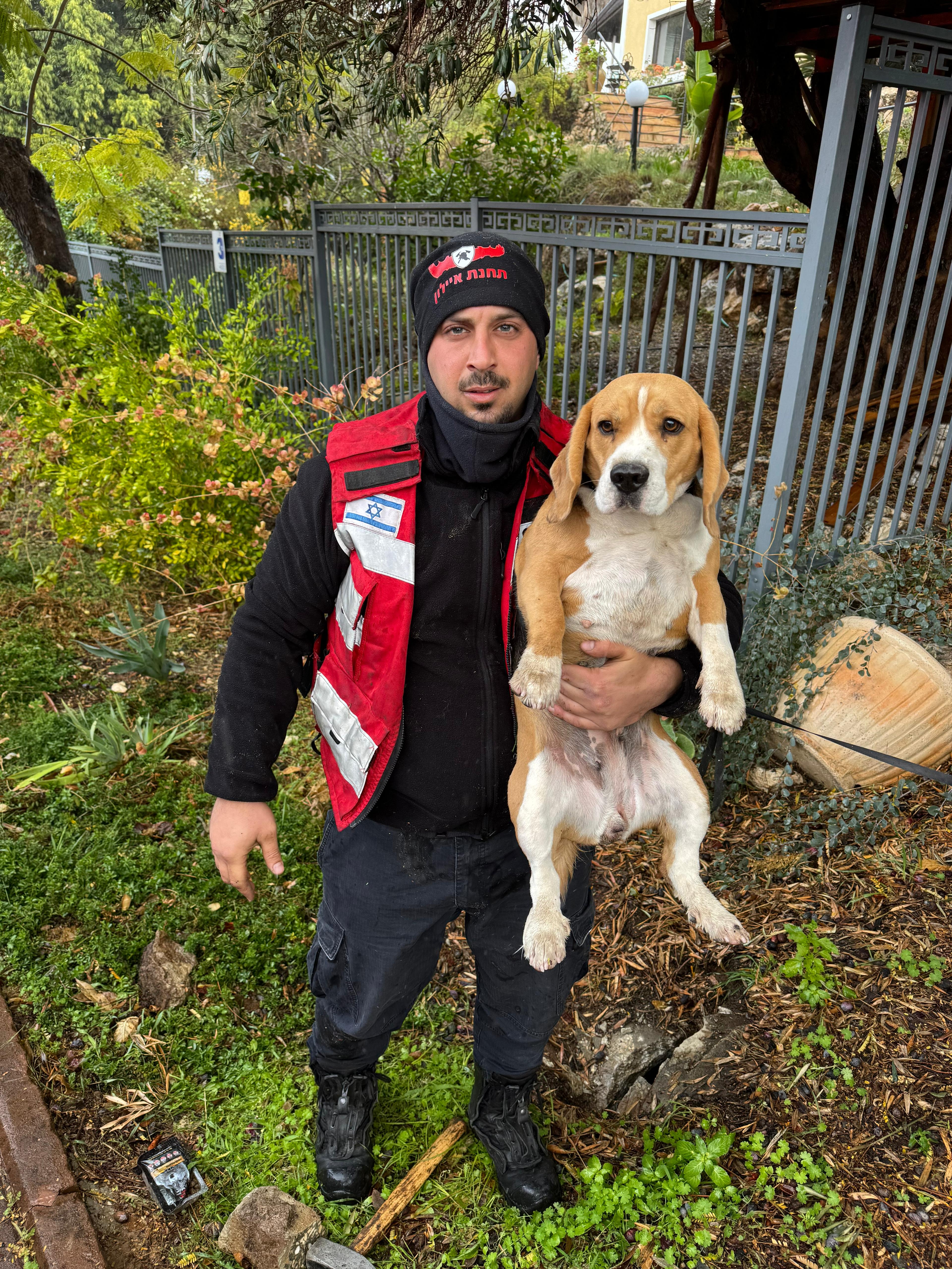 A rescuer and a dog.