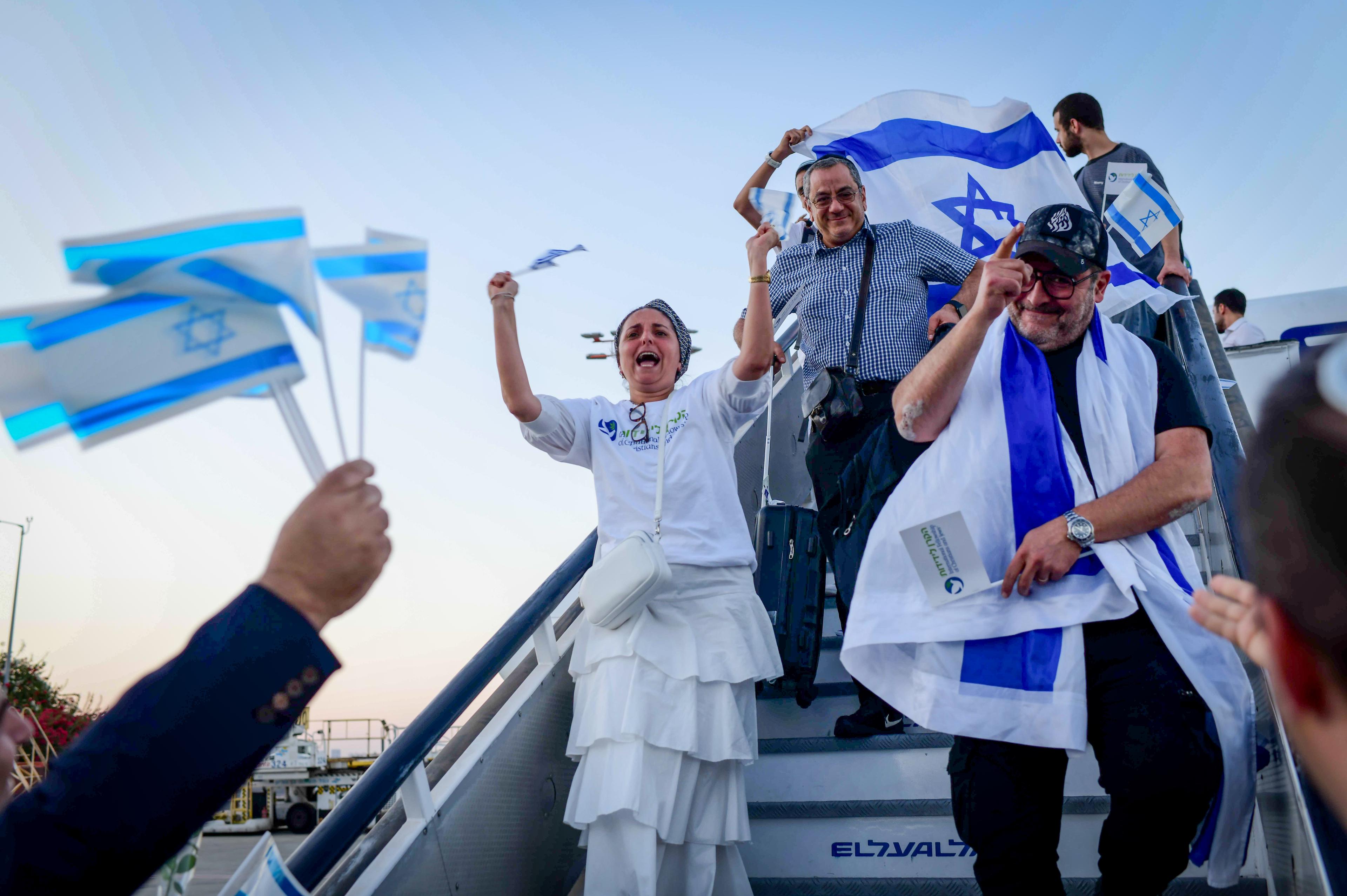 New immigrants from France arrive on a special " Aliyah Flight" at the Ben Gurion airport in central Israel on August 1, 2024