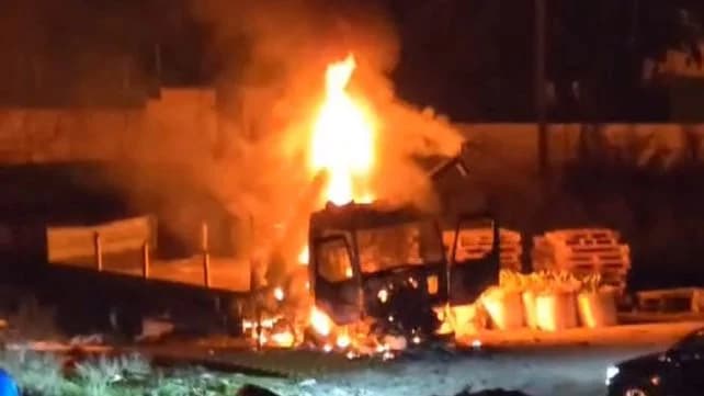 Israeli settlers light a truck alight Israeli settlers light a truck alight