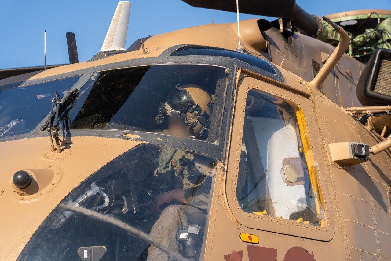 Helicopter ready for takeoff, with hostages.