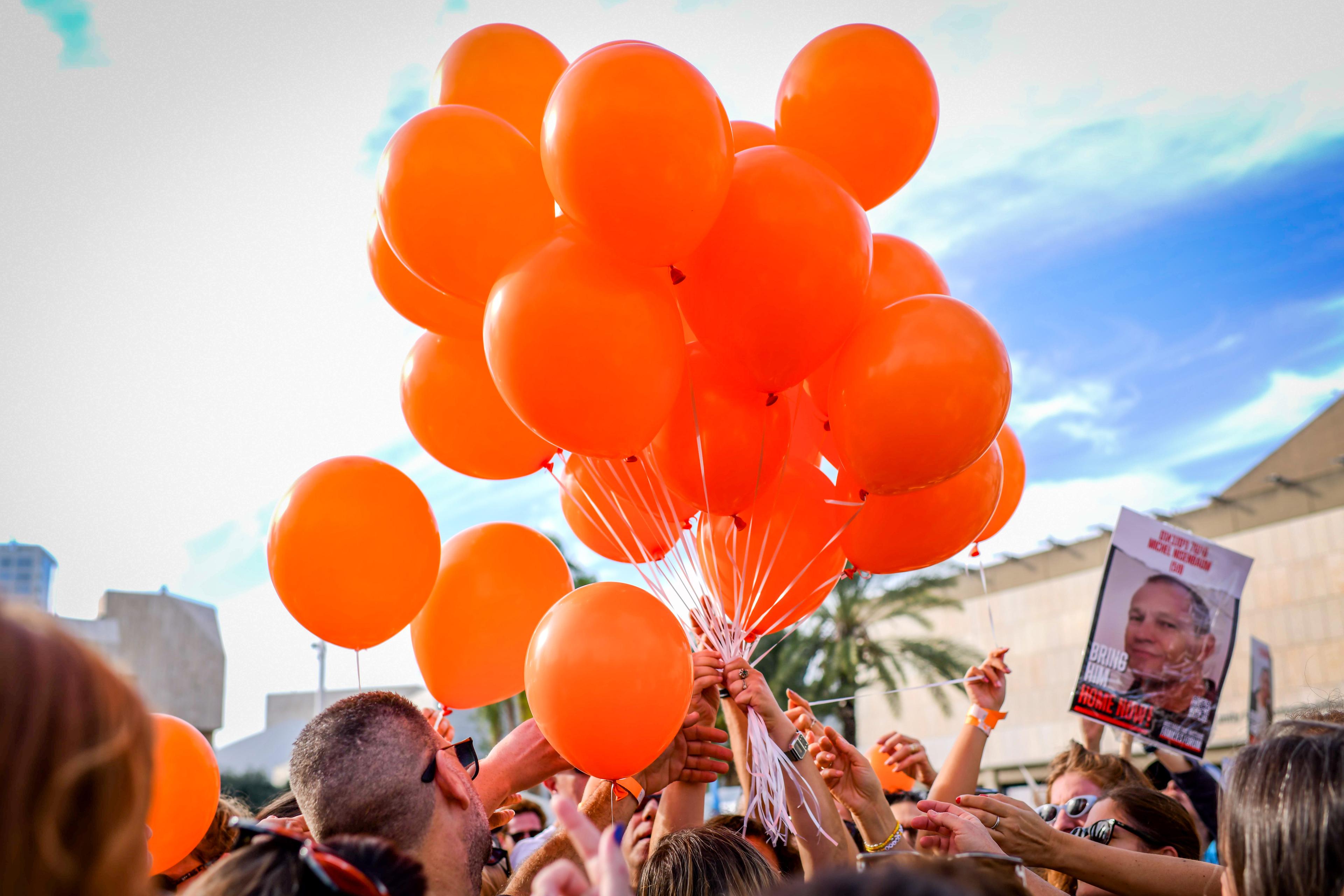 People take part in a protest calling for the release of Bibas family, 10 month old Kfir, 4 year old Ariel, and their parents Shiri and Yarden Bibas, at "Hostage Square" in Tel Aviv