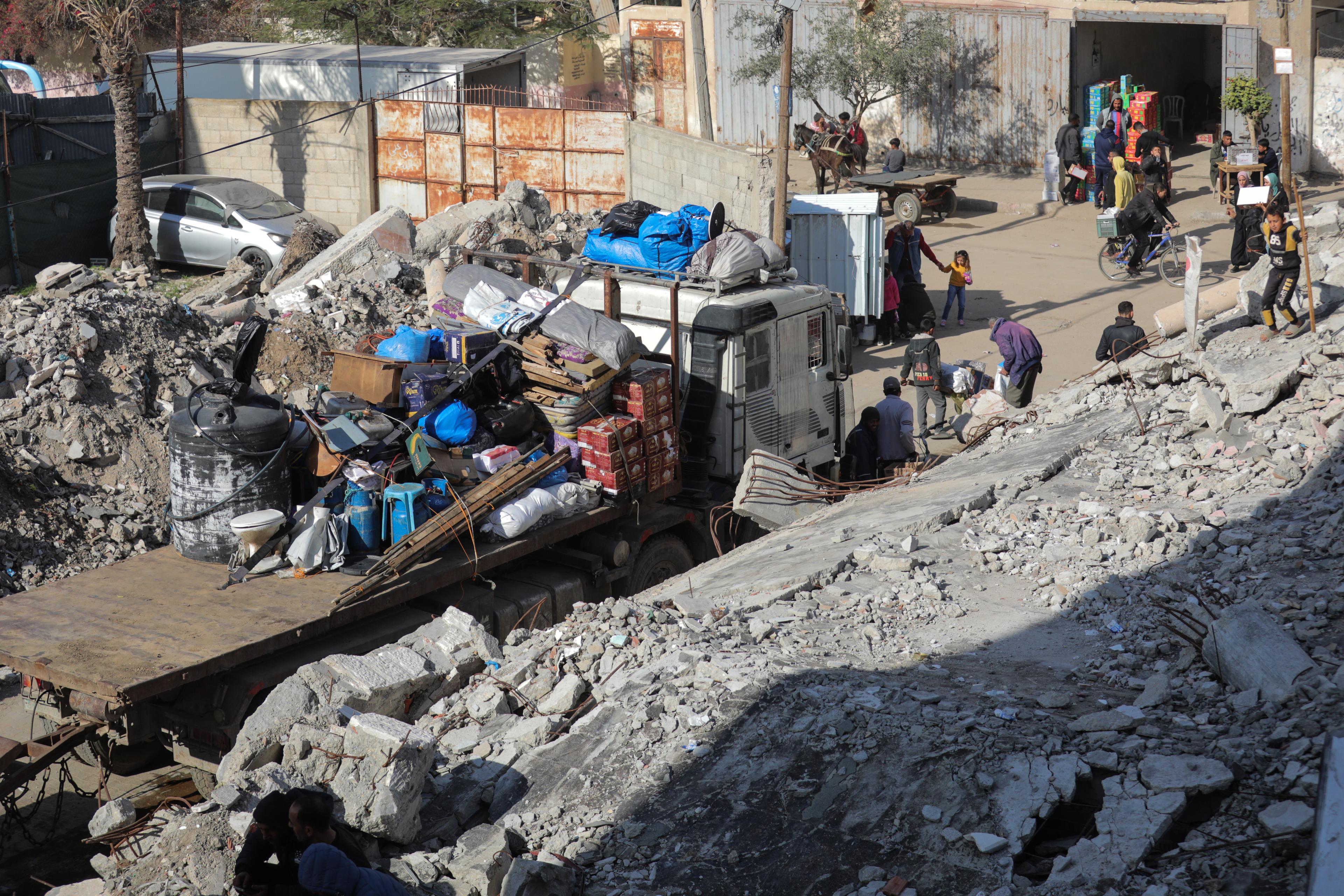 Palestinians transport people to Gaza City, following a ceasefire with Israel, on February 2, 2025