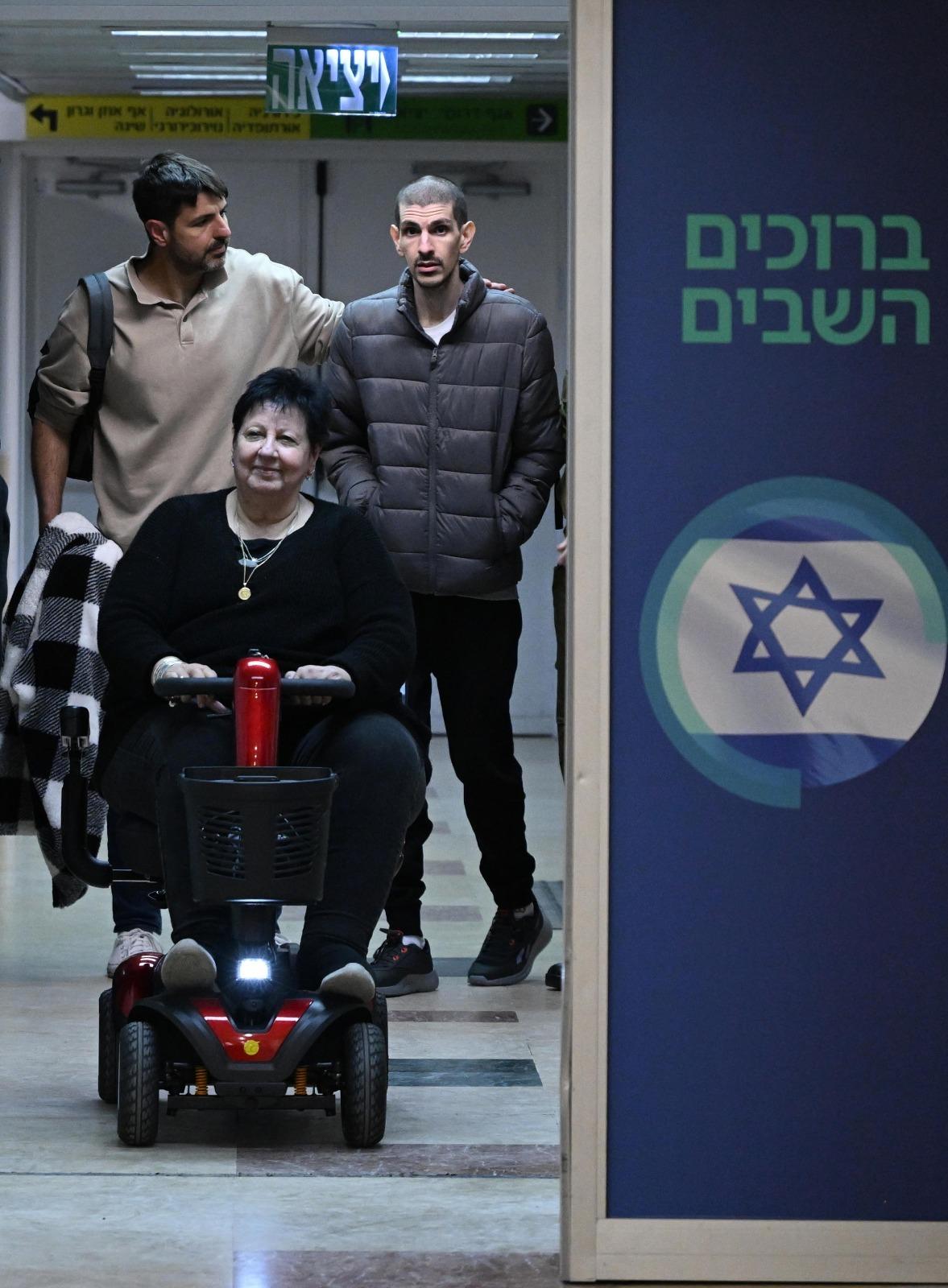 Hostage Eli Sharabi being taken to the hospital. Hostage Eli Sharabi being taken to the hospital.