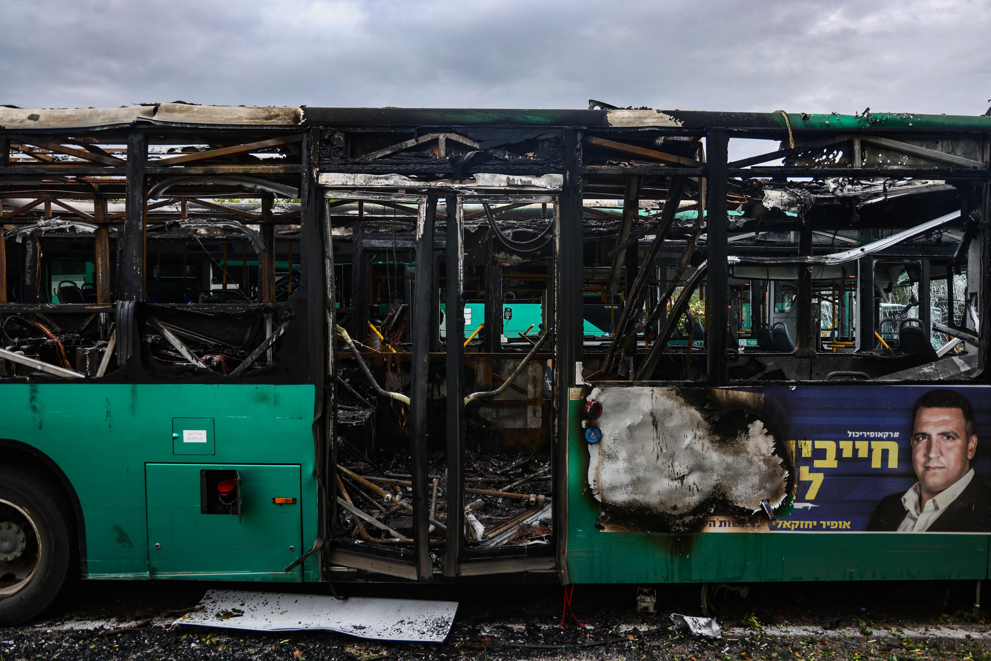 Buses destroyed in Hezbollah missile attack in Kiryat Shmonah.