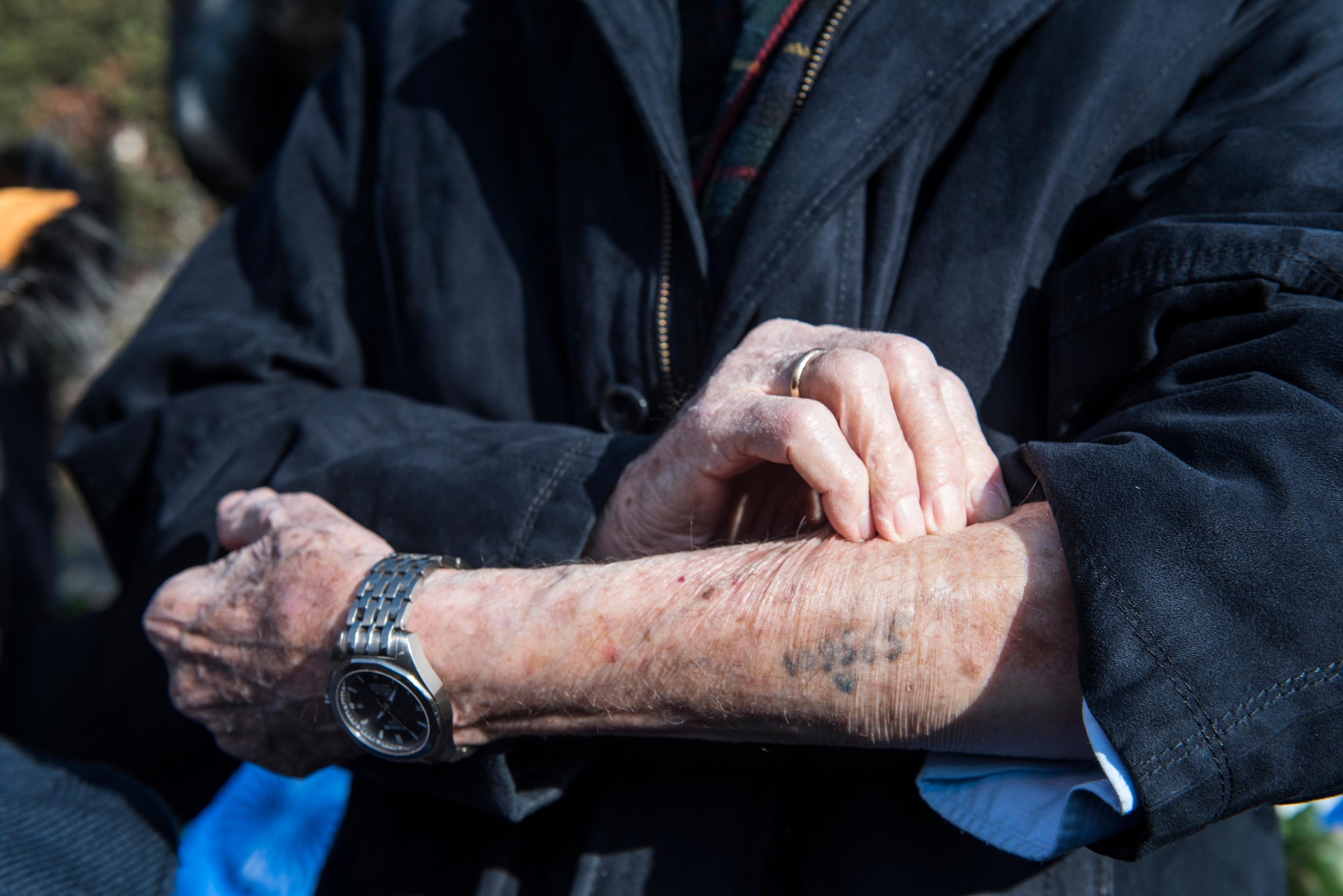 Greece: A Jewish Holocaust survivor shows his Holocaust tattoo