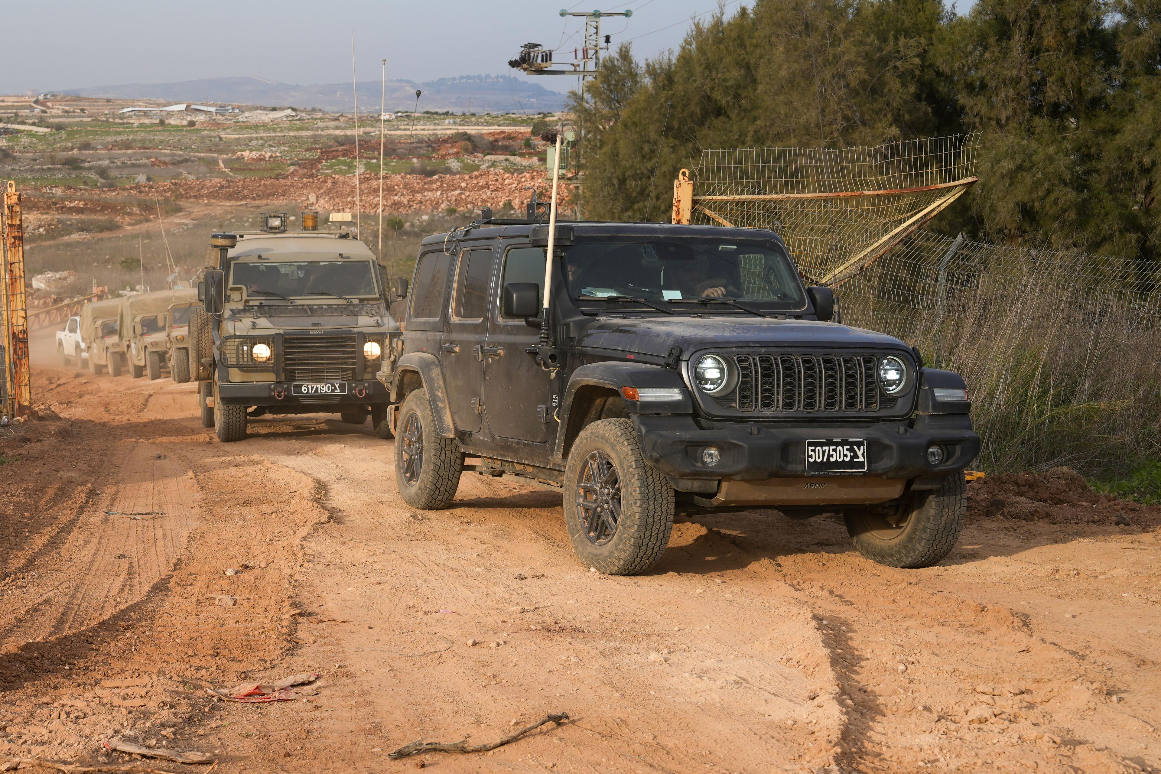 IDF forces along northern border fence.