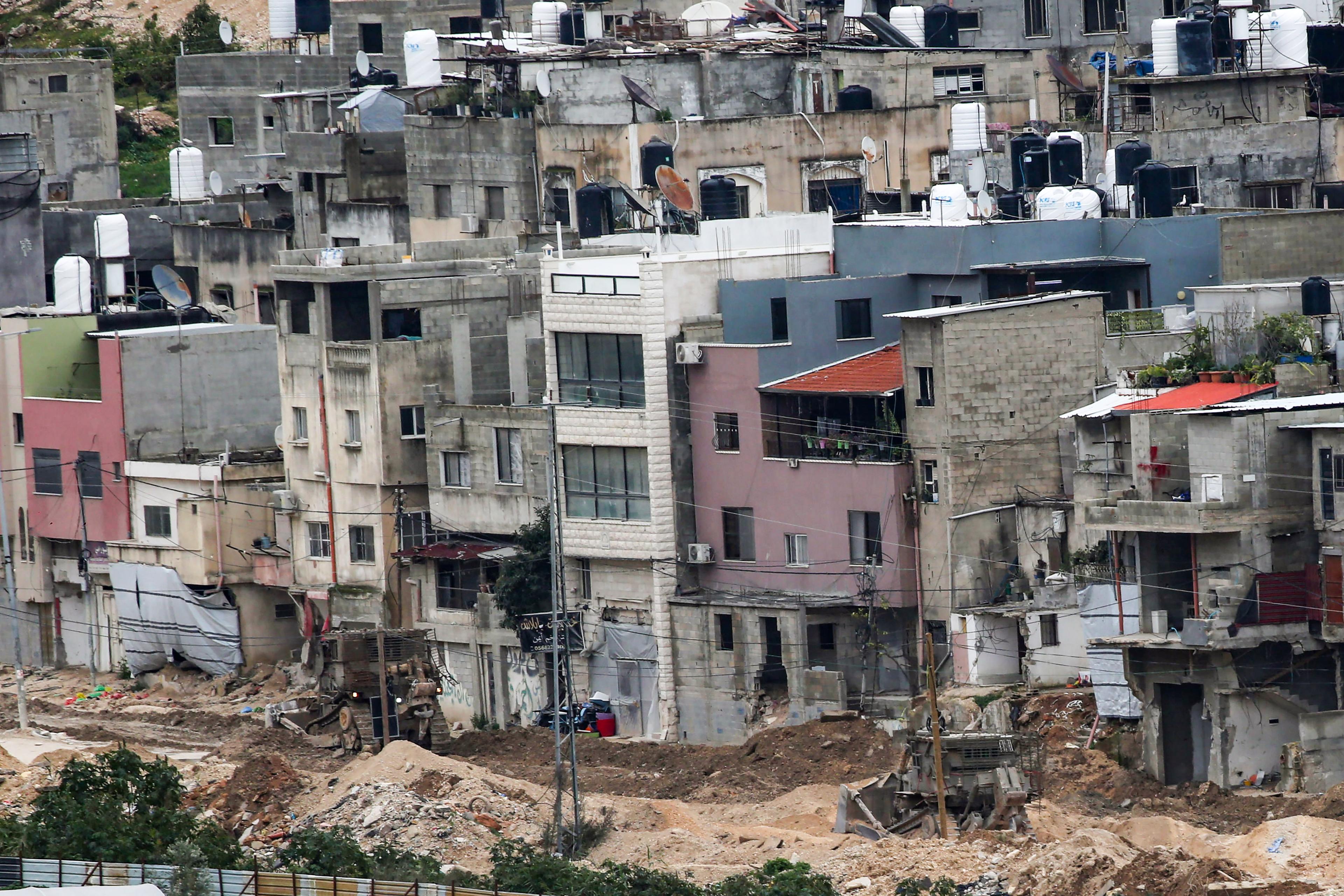 Israeli security forces seen during a raid in Nur Shams refugee camp, in the city of Tulkarem, February 9, 2025