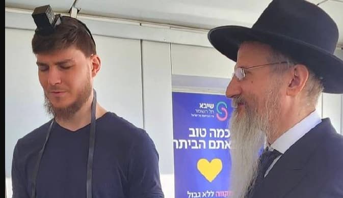 Sasha Trufanov with the Chief Rabbi