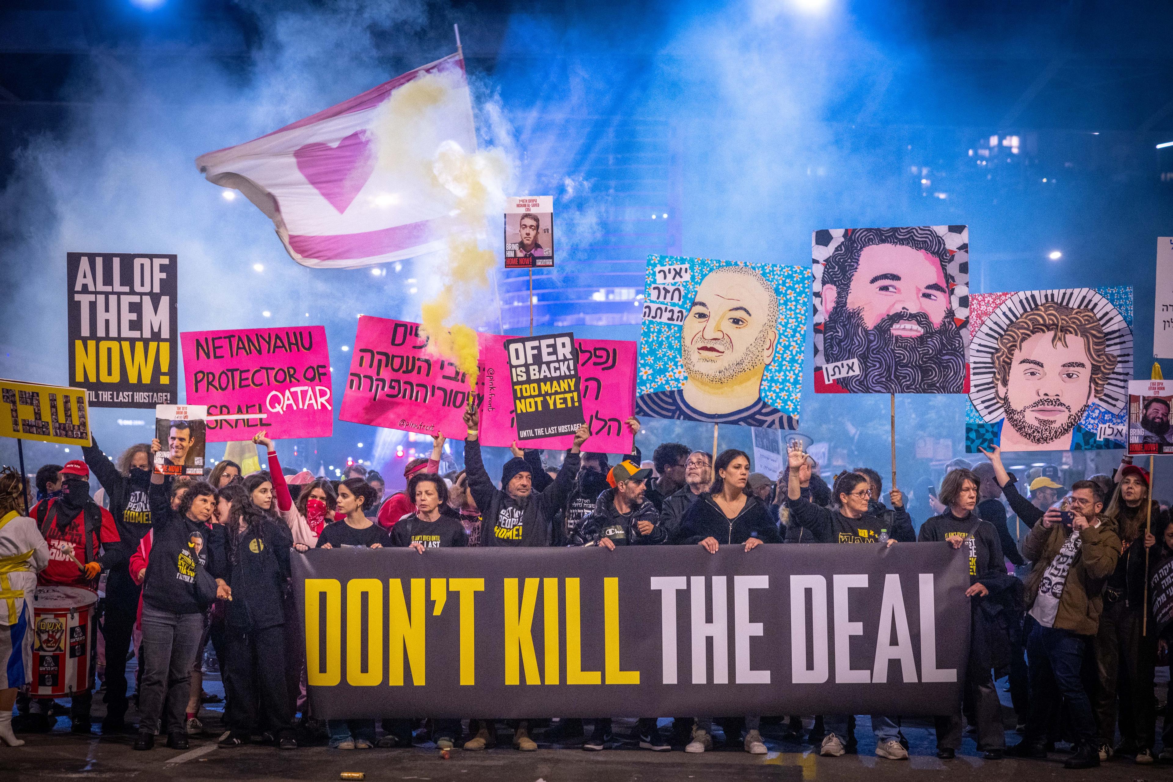 Demonstrators protest for the release of Israelis held hostage in the Gaza Strip, outside Hakirya Base in Tel Aviv, February 15, 2025.