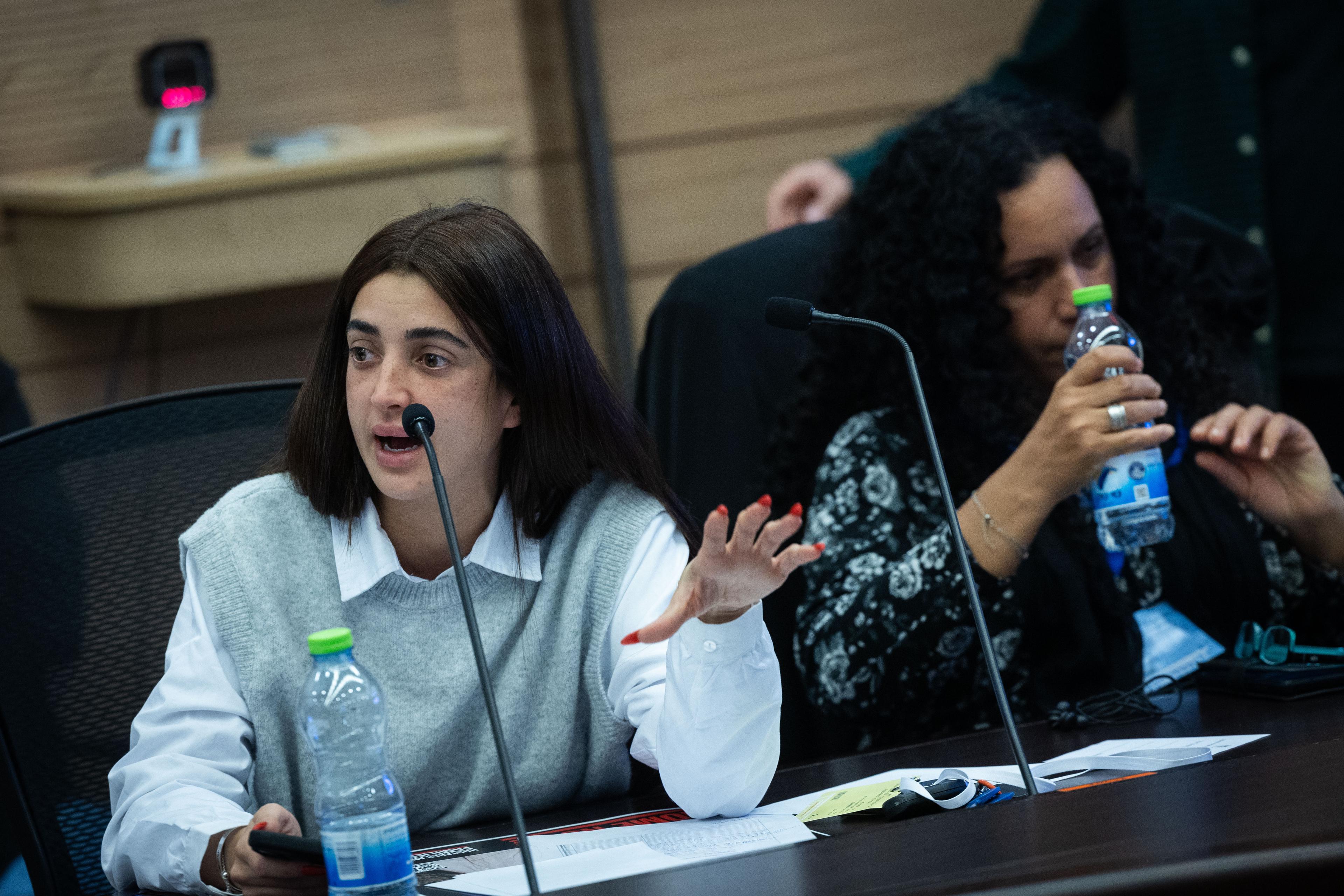 Ziv Abud, the girlfriend of Eliya Cohen whose held hostage in the Gaza Strip attends a special committee for public inquiries at the Knesset, the Israeli Parliament in Jerusalem, on December 3, 2024. 