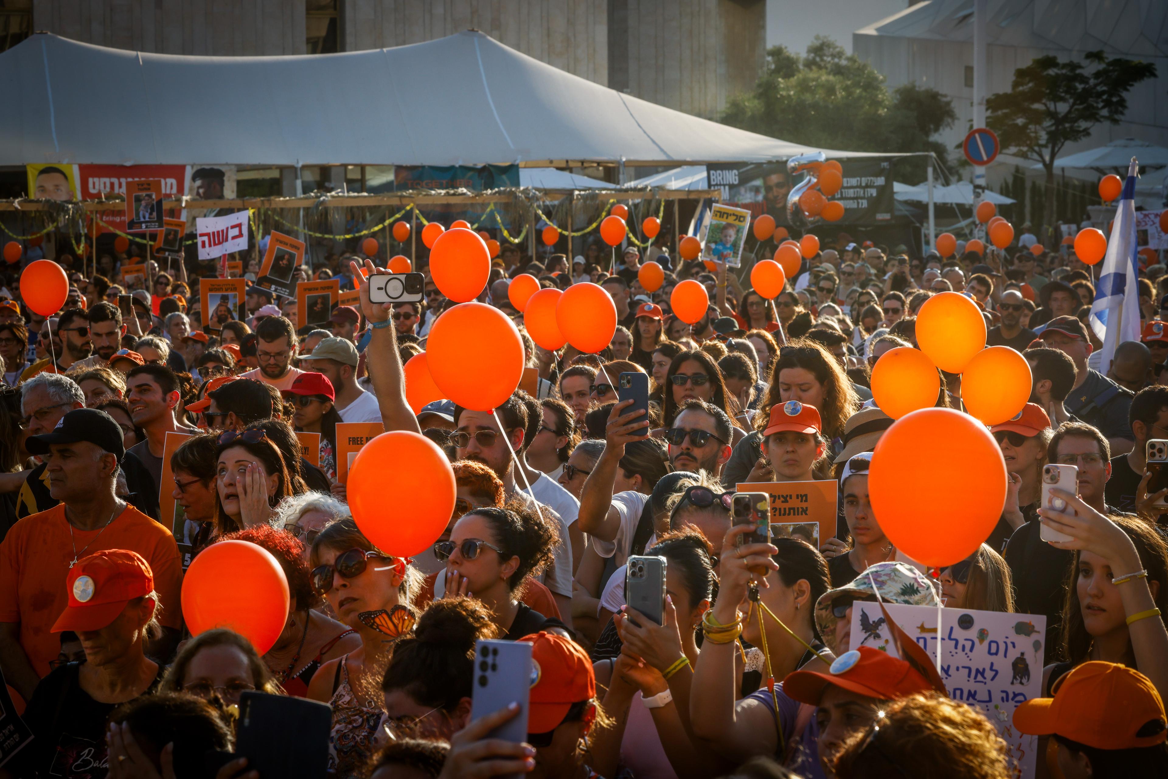 Relatives of Israeli hostage Ariel Bibas and supporters mark his 5th birthday in Hamas captivity, at Hostage Square in Tel Aviv, August 5, 2024.