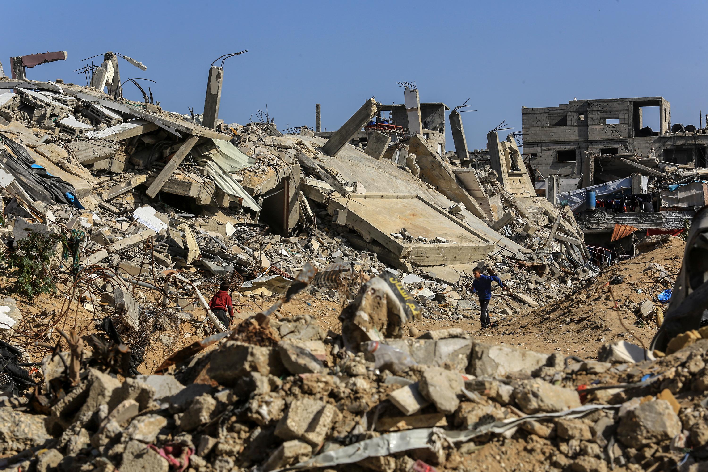 Palestinians live among the rubble of their homes which were destroyed in the war between Israel and Hamas, in the city of Khan Yunis, southern Gaza Strip. 