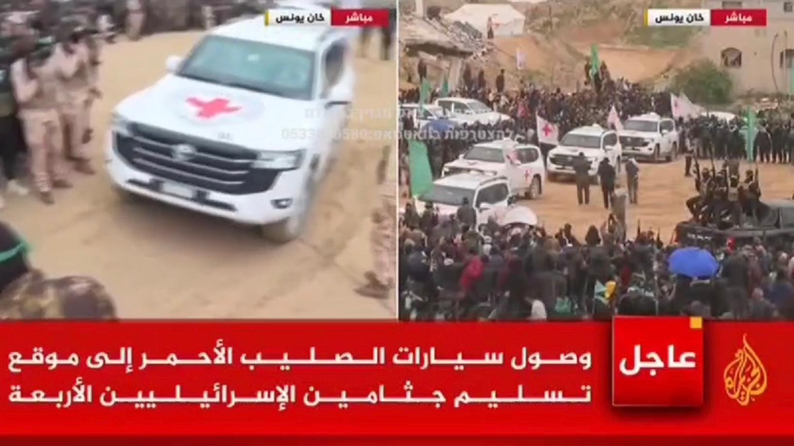 Red Cross vehicles arrive to collect bodies of slain Israeli hostages