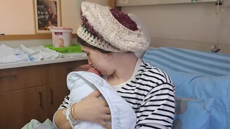Meitar Eliyahu after the birth of her son