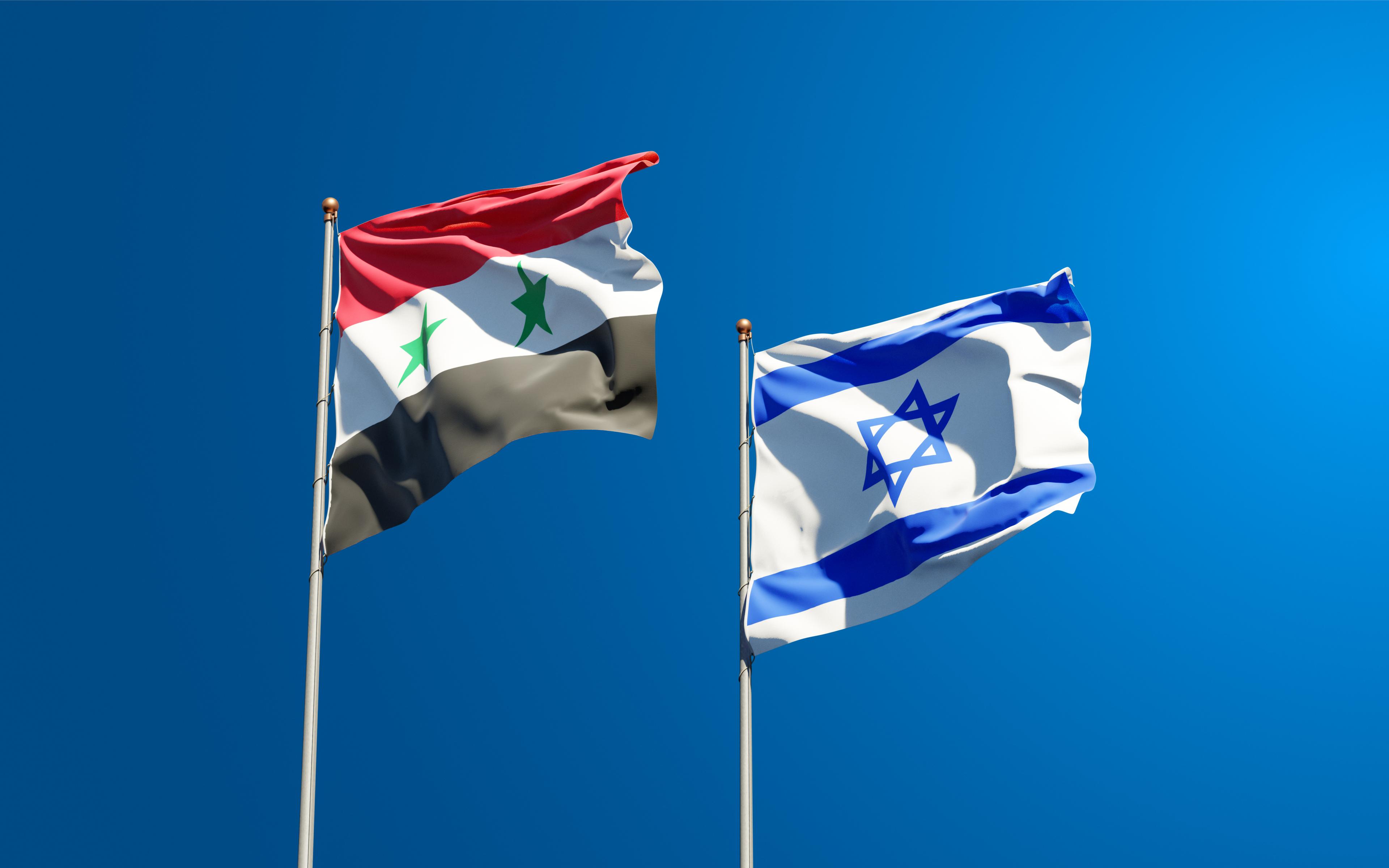 Israel and Syrian flags.