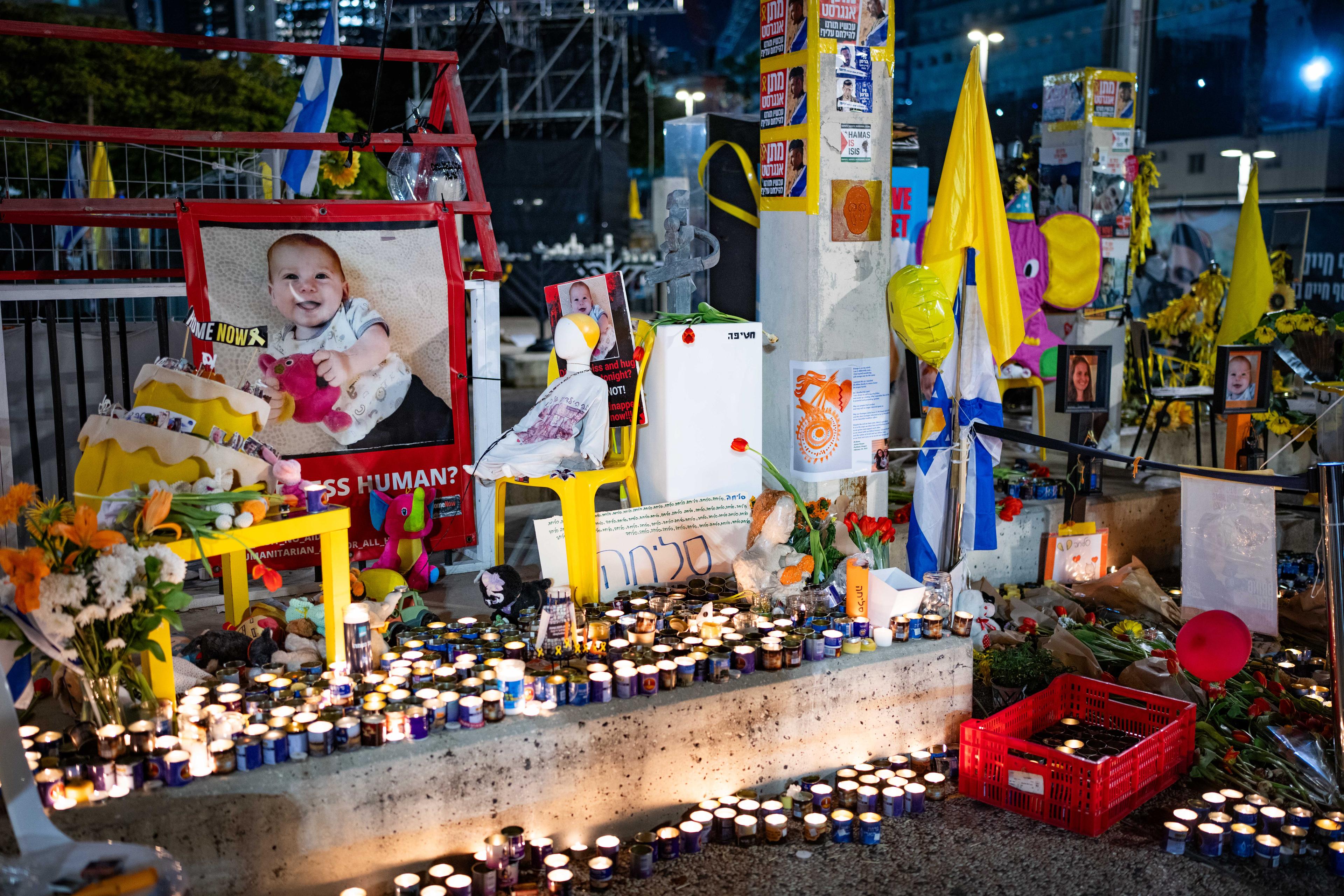 Lighting candles for murdered hostages.
