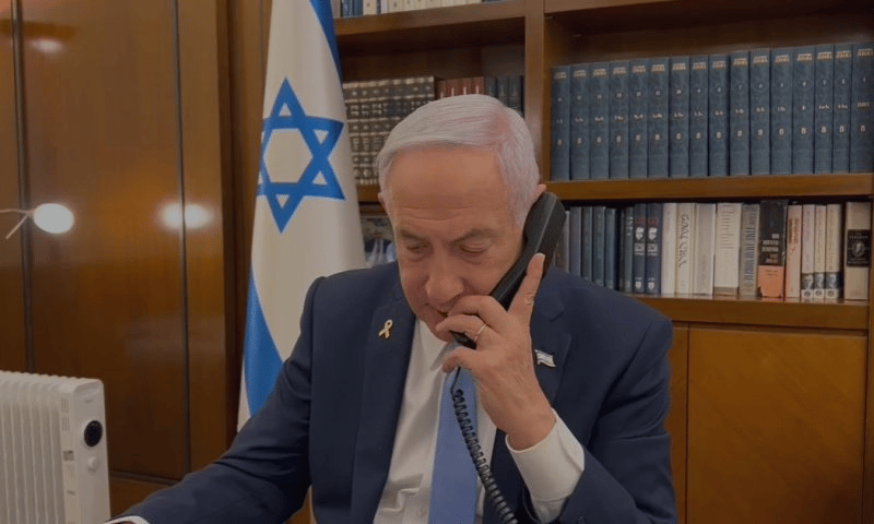 Benjamin Netanyahu on the phone with Eli Sharabi