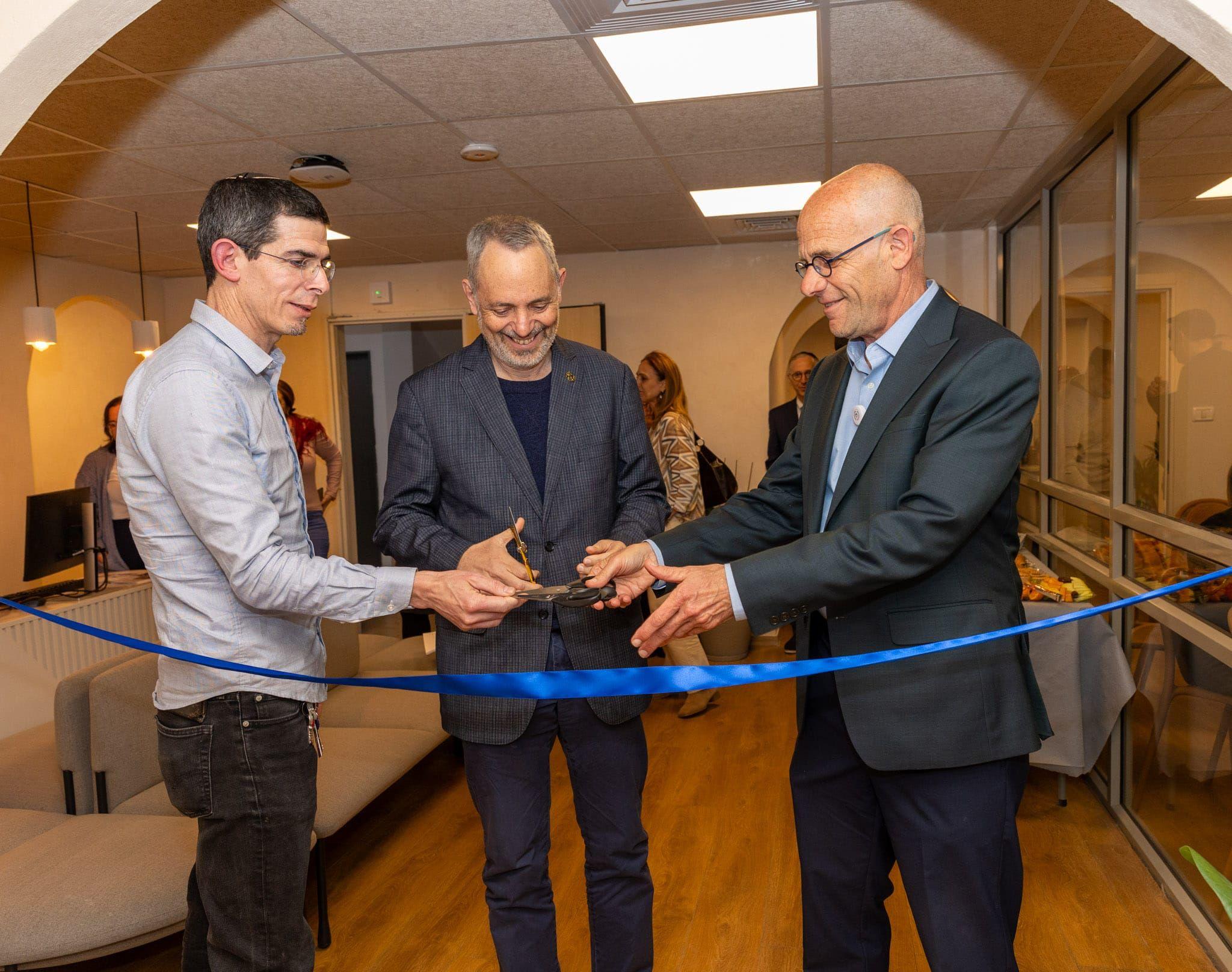 Cutting the ribbon for a better life.